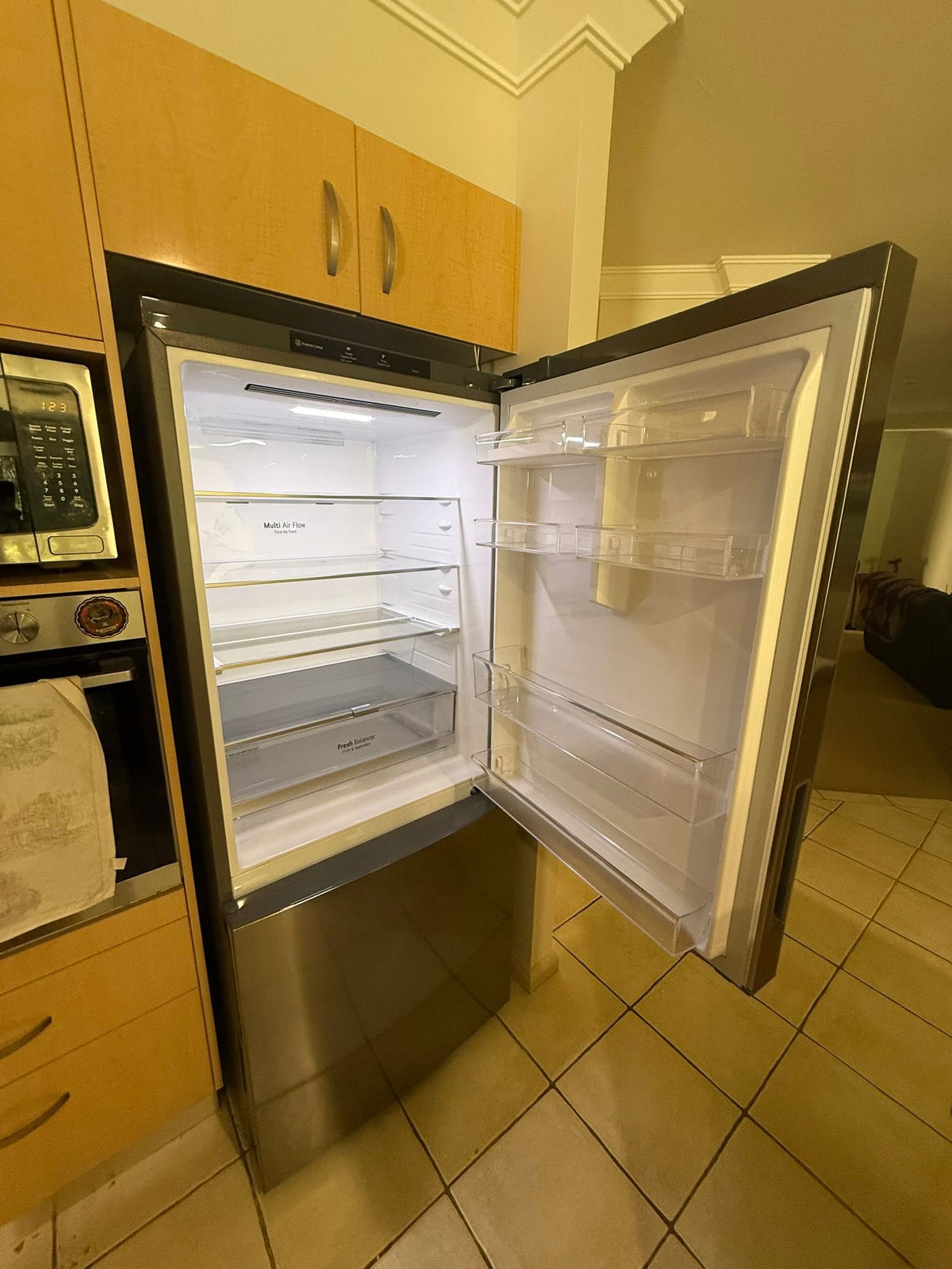 Interior of an installed LG refrigerator with both doors open